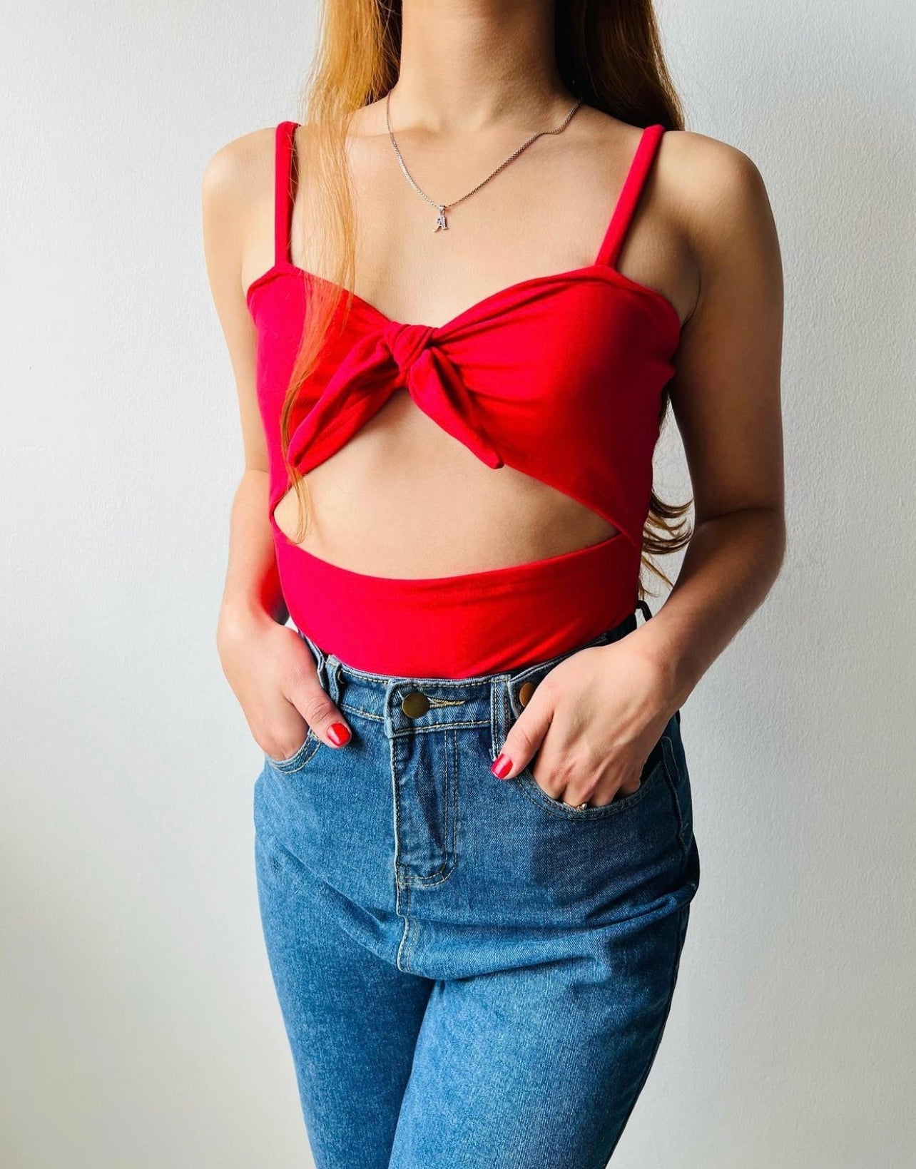 Body de tiras con moño al frente