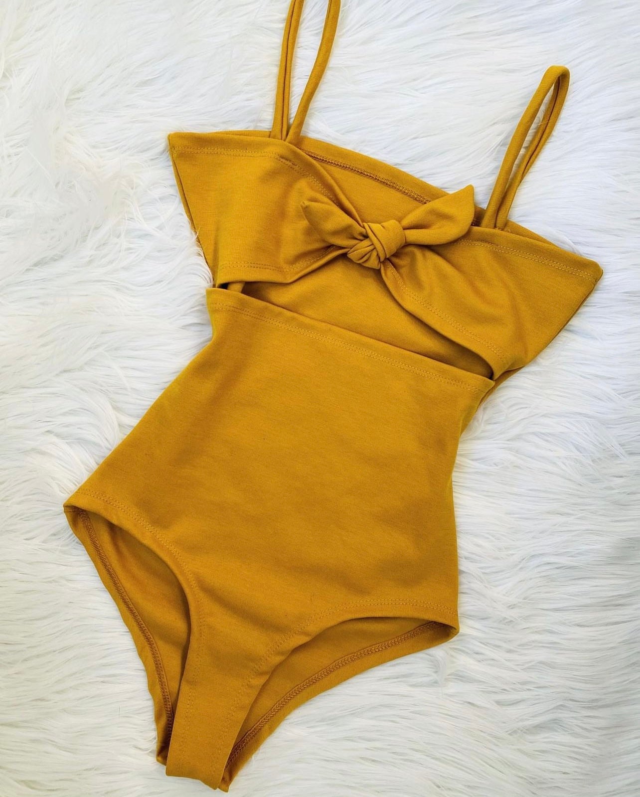 Body de tiras con moño al frente